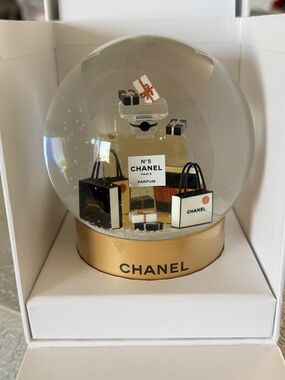 CHANEL gold, black and white decorative snow globe